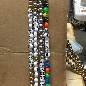 (4) ALL REMAINING 2024 PARIS OLYMPICS … NECKLACES ONLY ... OSFM